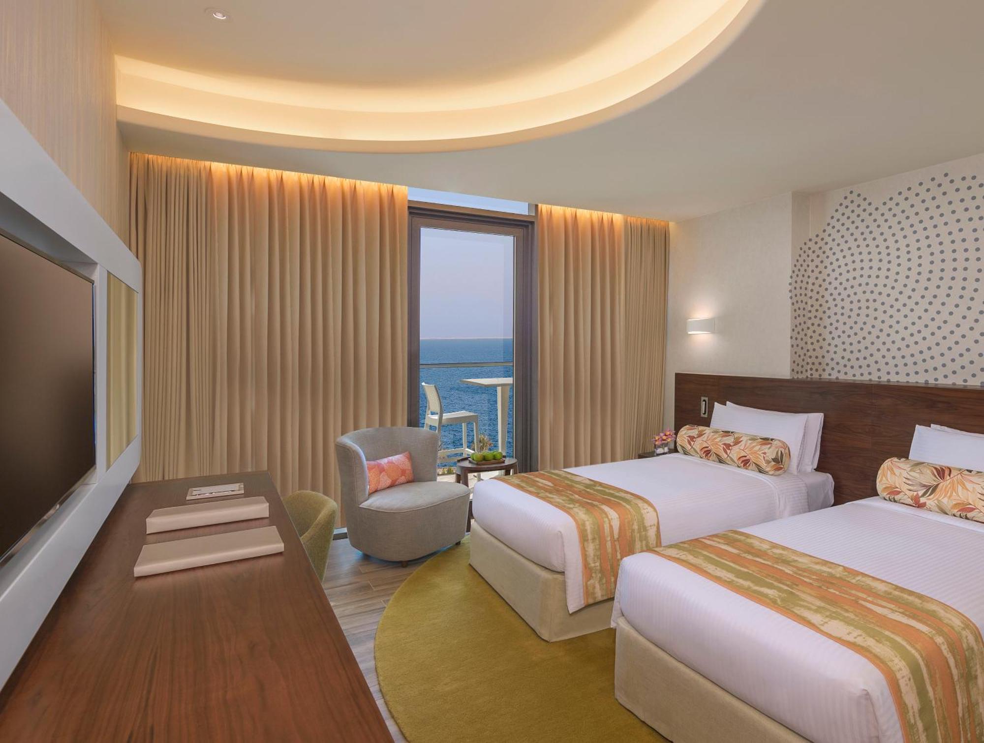 Deluxe Room with Balcony and Partial Sea View