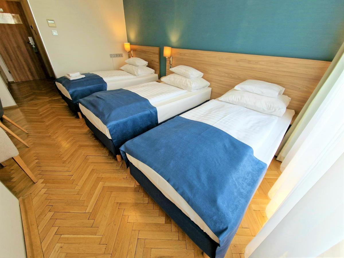 Comfort - Kolmen hengen huone