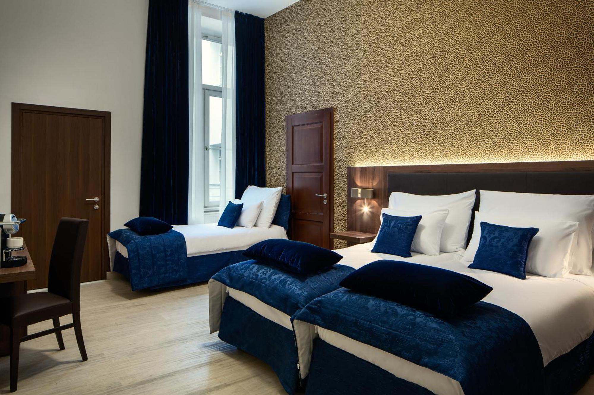Deluxe - Kolmen hengen huone