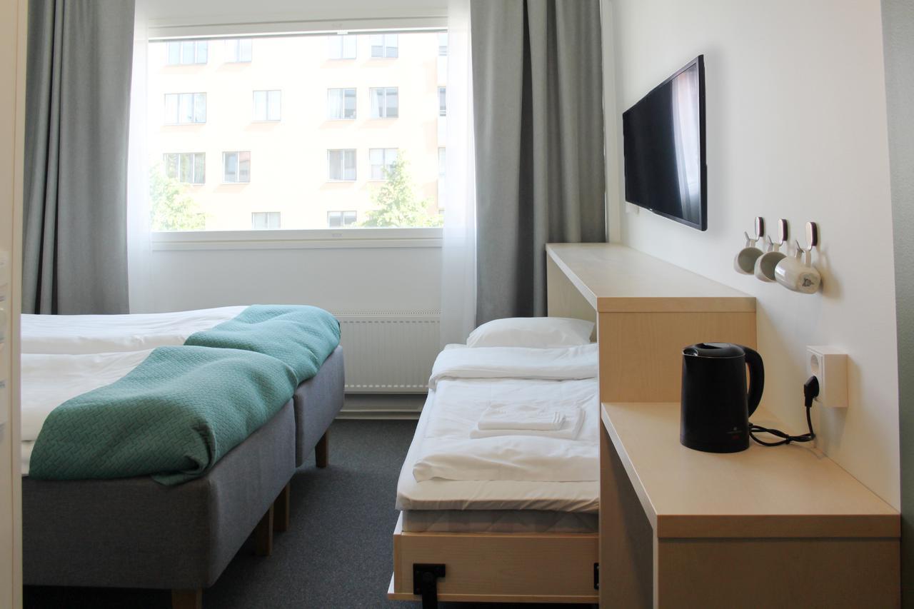 Standard - Kolmen hengen huone