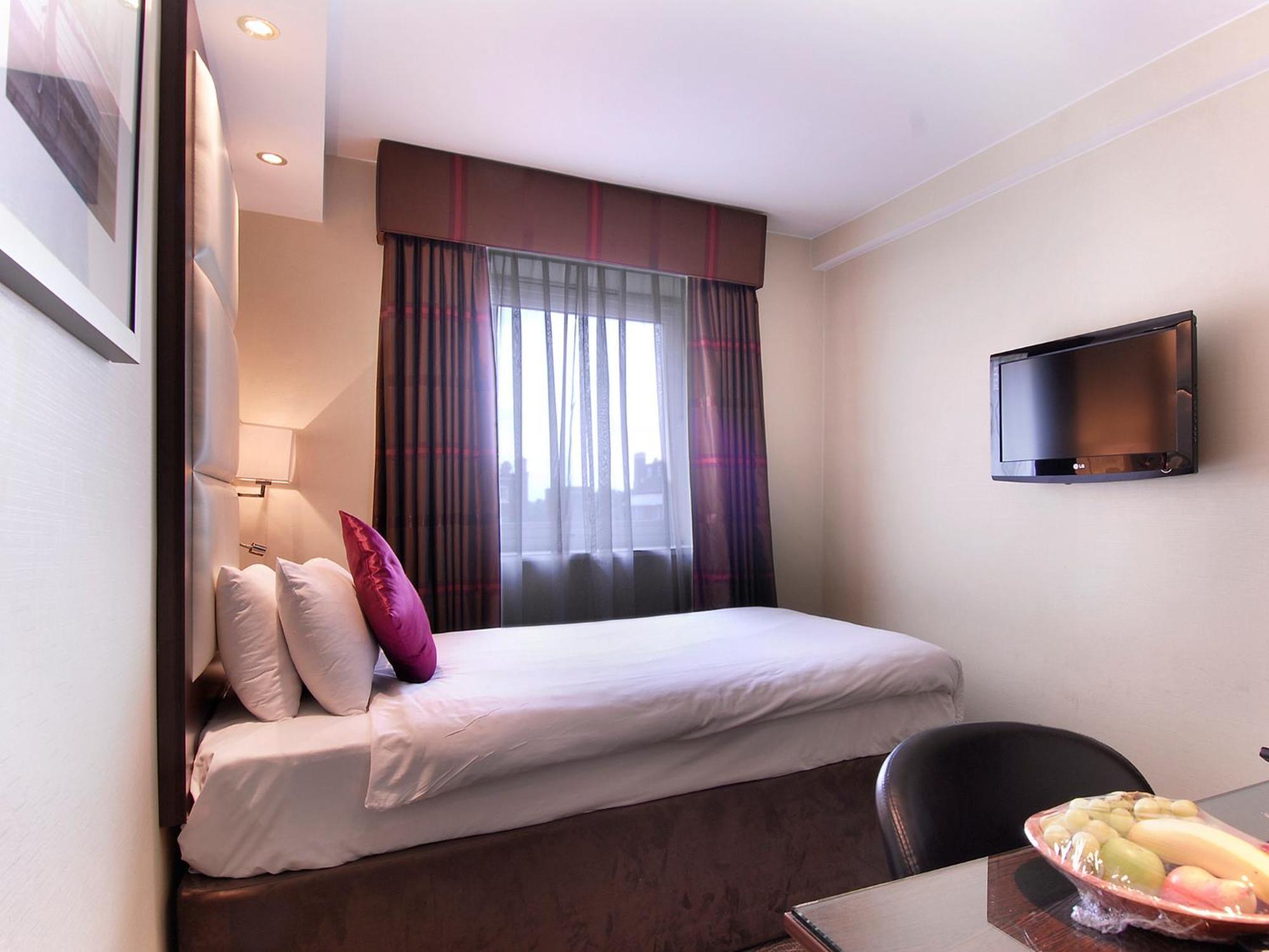 Deluxe ‑ Yhden hengen huone