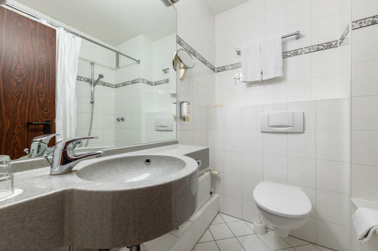 Deluxe - Kolmen hengen huone
